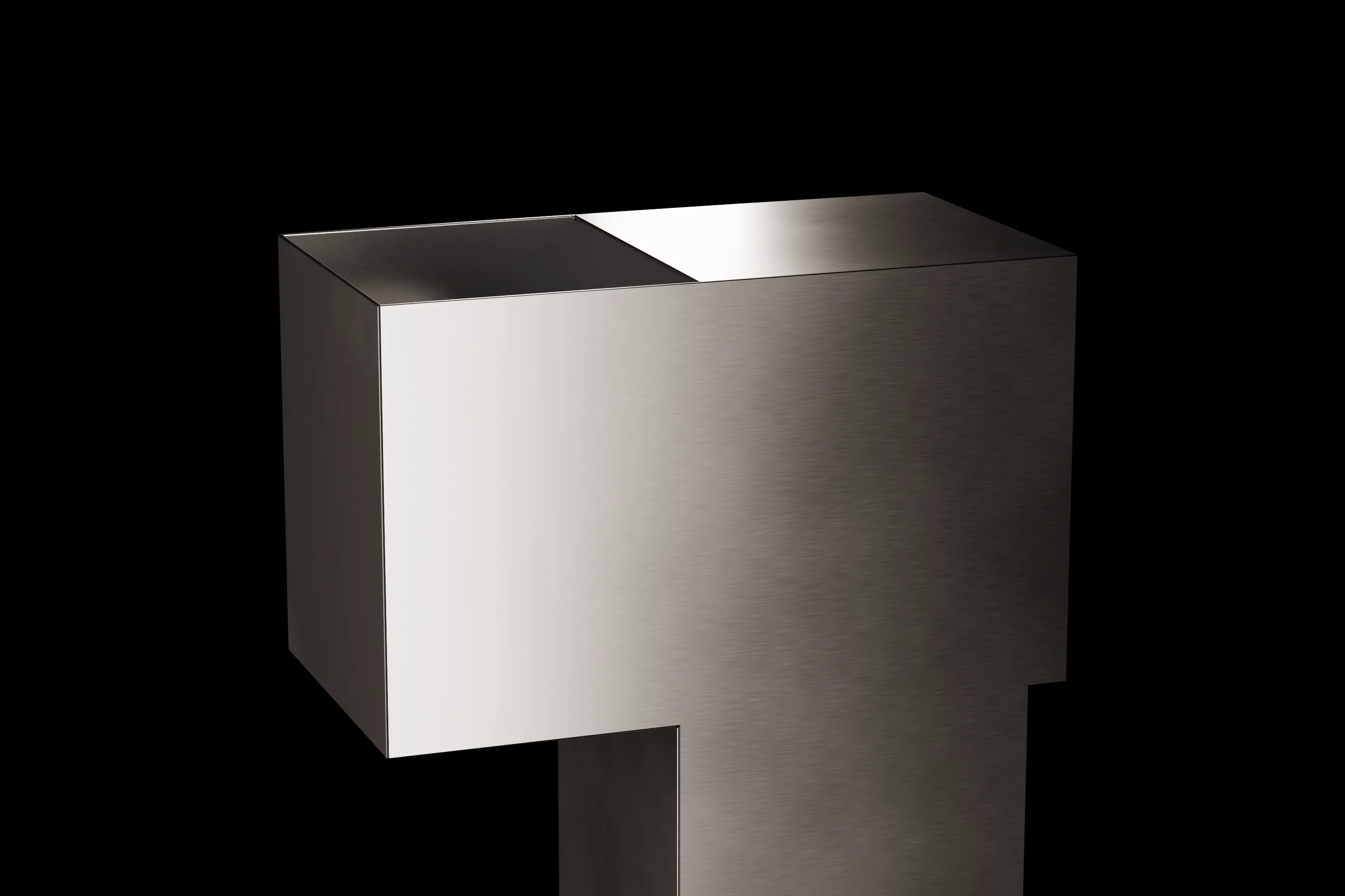 Detail of the raw aluminum housing and folded edges against a black background.